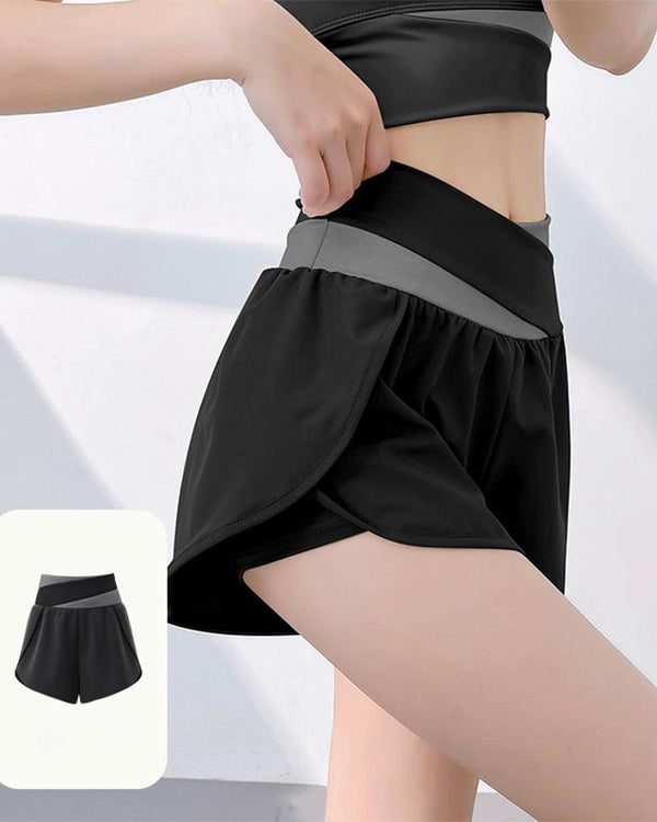 Women’s black high waisted yoga shorts with pockets