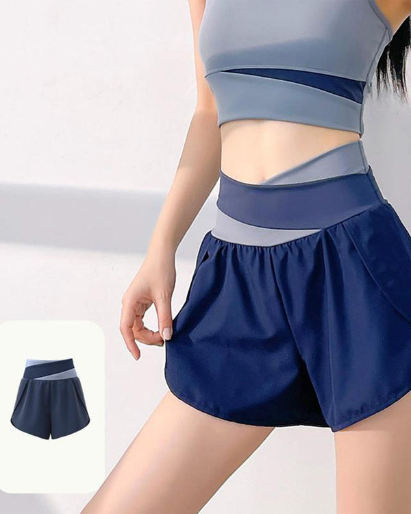 Women’s blue high waisted yoga shorts with pockets
