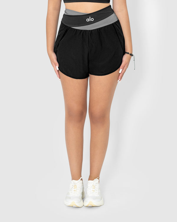 Women’s black high waisted yoga shorts with pockets